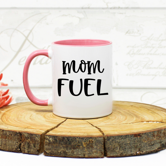 Pink mom coffee mug with 'warm drink. zero thoughts.' text.