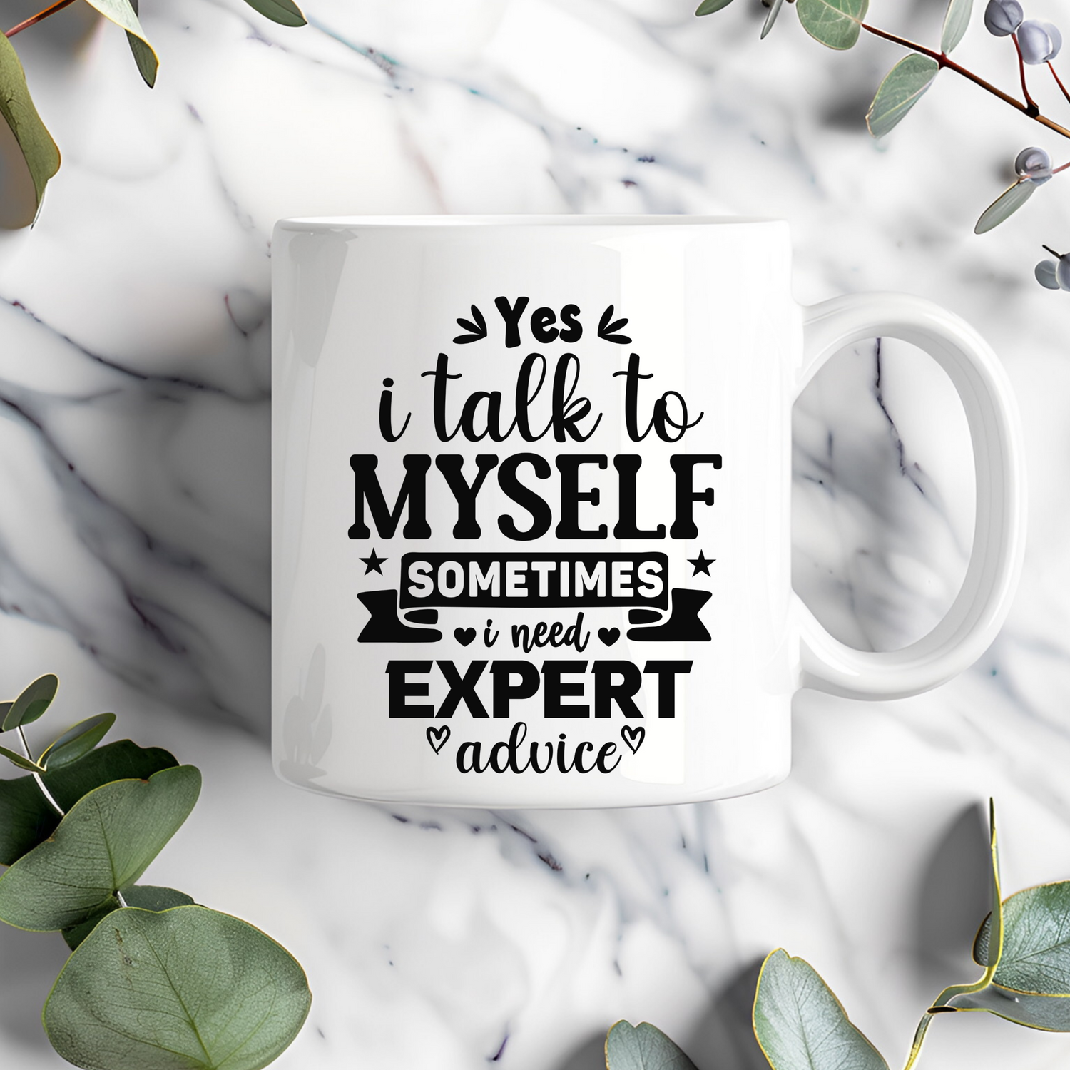 A white coffee mug with “yes I talk to myself sometimes I need expert advice” text