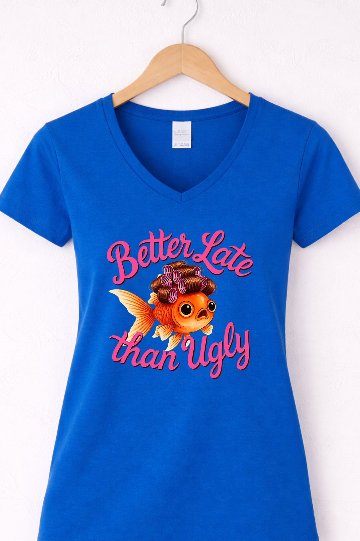 Blue women’s v neck cute fish t shirt featuring glam goldfish and “Better Late Than Ugly” saying