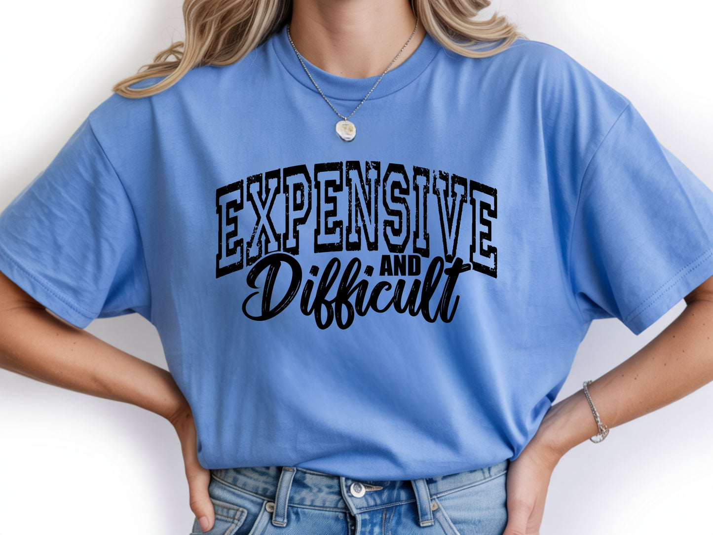 Person wearing blue unisex expensive and difficult shirt with bold “Expensive and Difficult” statement graphic