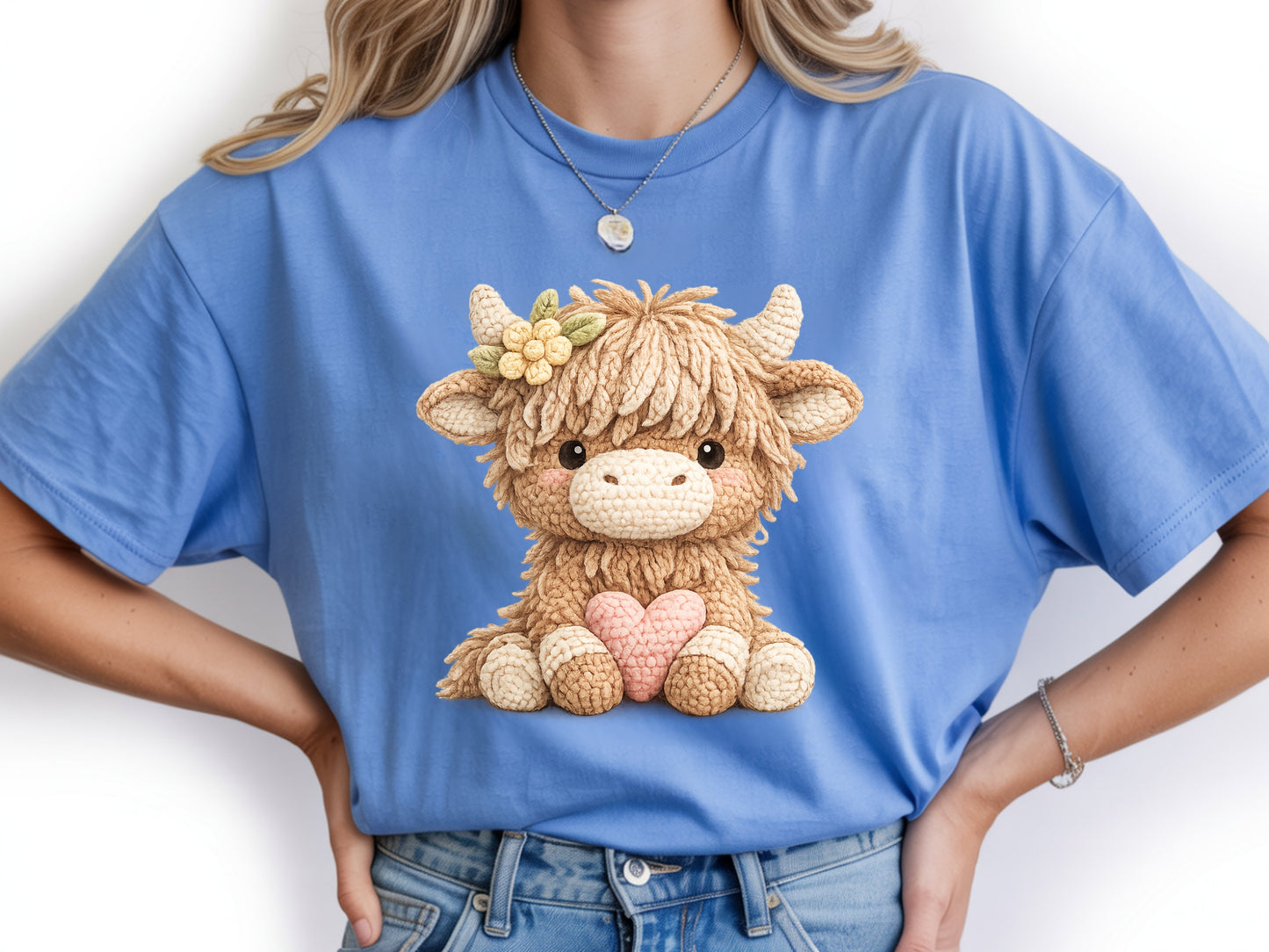 Woman wearing blue highland cow t shirt with cute cow heart graphic