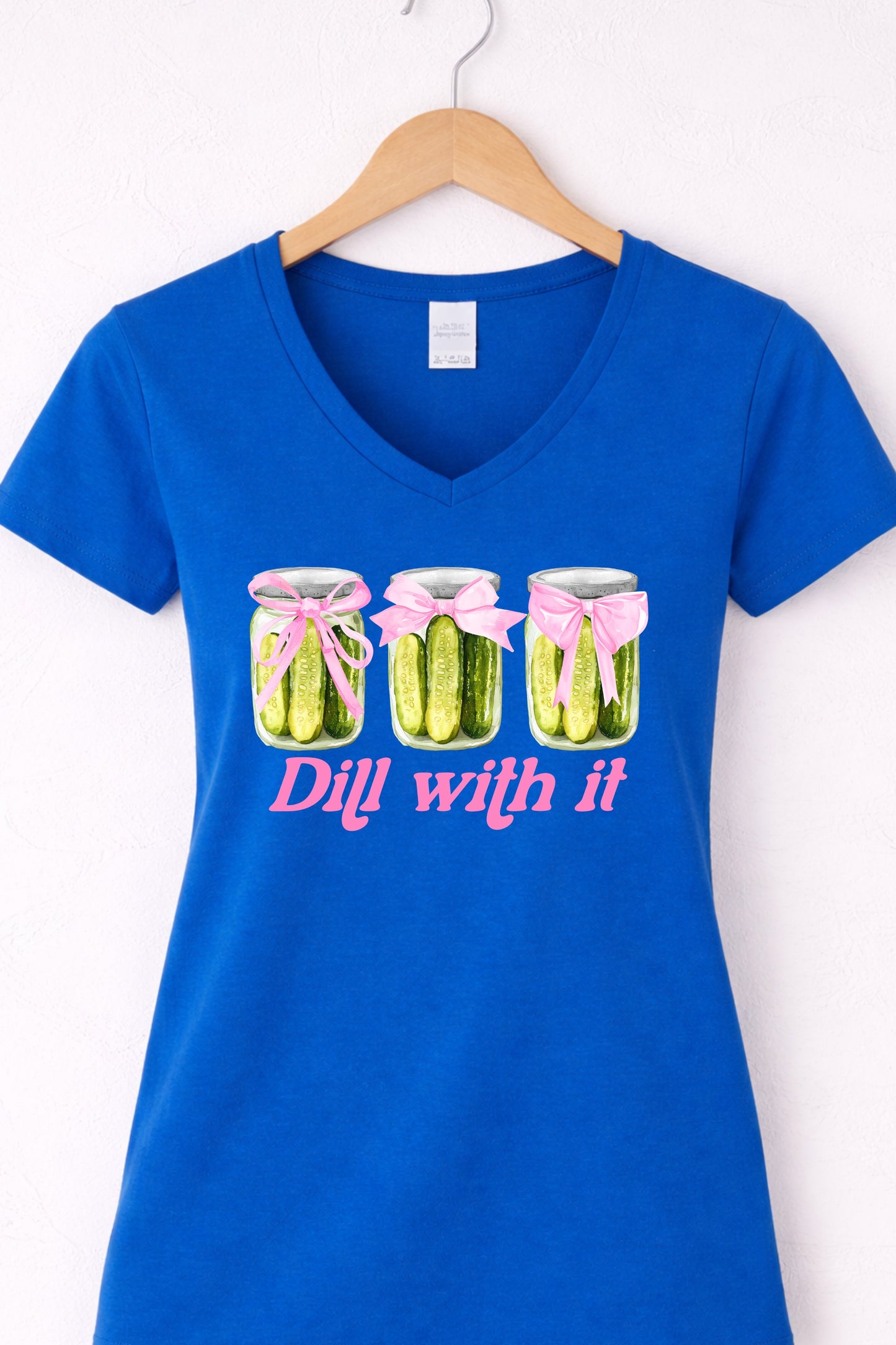 Blue women’s v neck pickle t shirt featuring trendy pickle lover “Dill With It” design