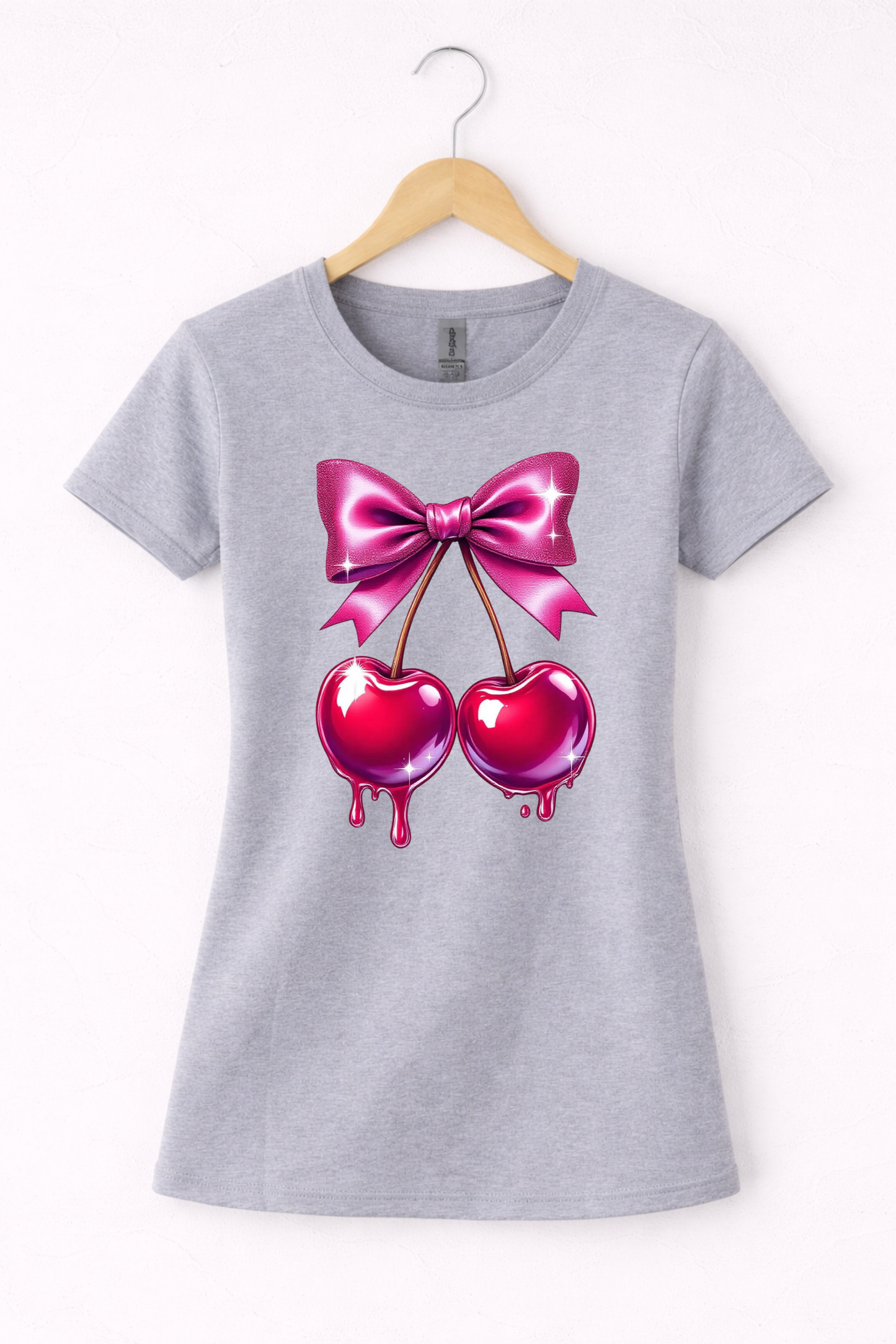 Cherry shirt for women with cute pink bow and cherry graphic on a grey women's crewneck tshirt.