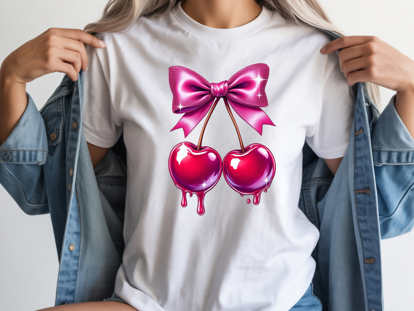 Cherry shirt for women with cute pink bow and cherry graphic on a white unisex tshirt. 