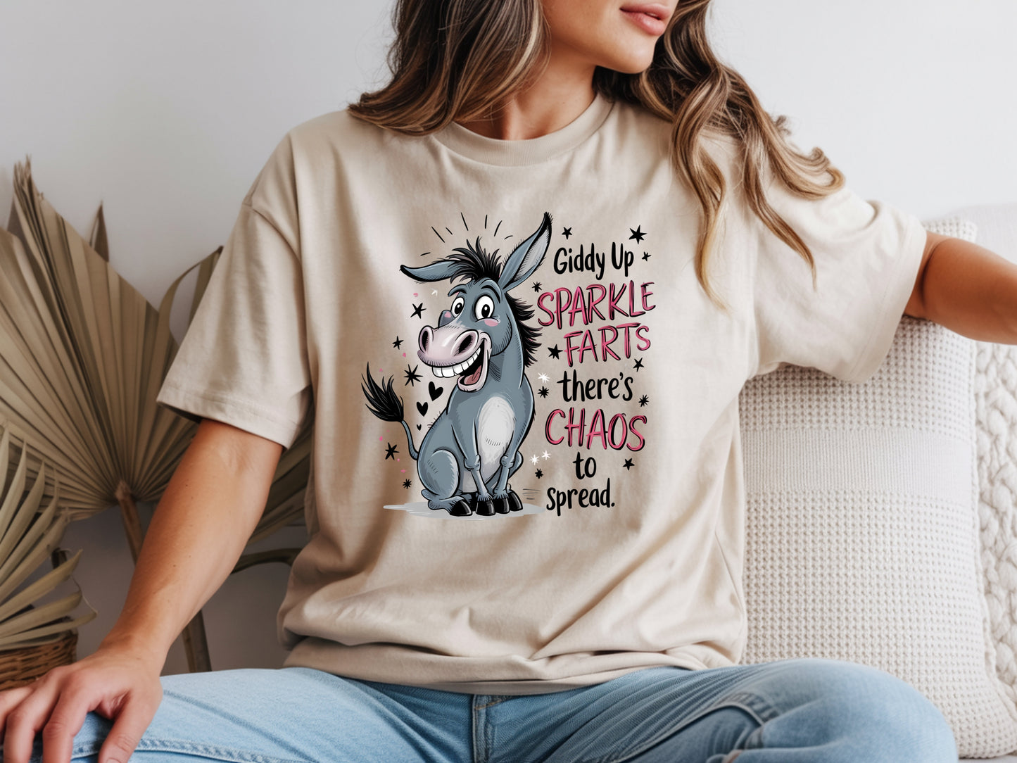 Person wearing beige unisex funny donkey t shirt with sarcastic chaos quote graphic