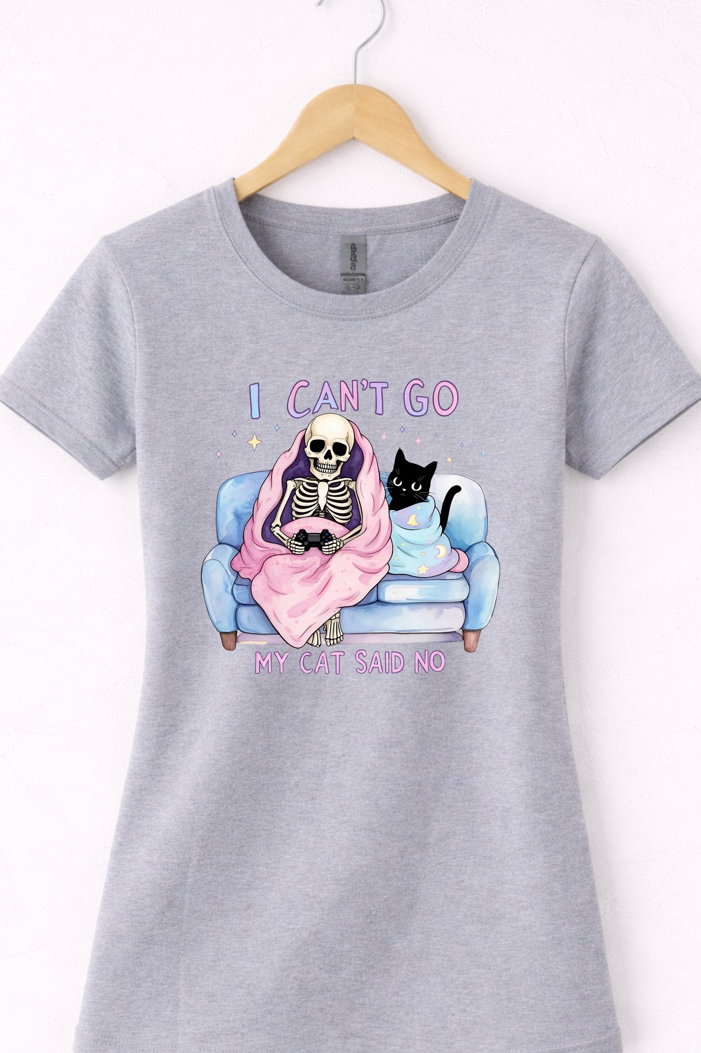 Grey women’s crewneck cat lover graphic tee with skeleton and “I Can’t Go My Cat Said No” design