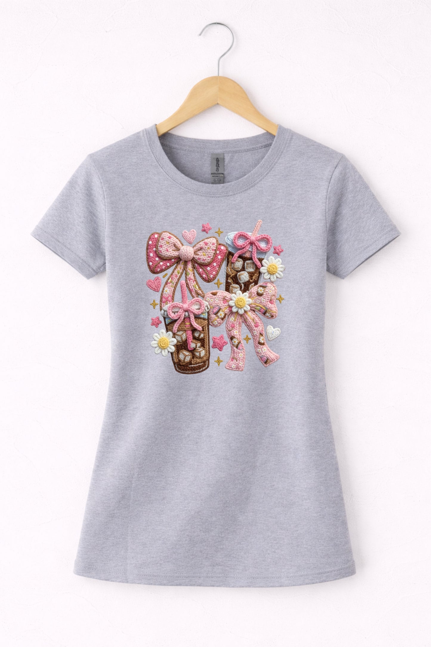Grey women’s crew neck iced coffee t shirt with coquette style bow coffee design