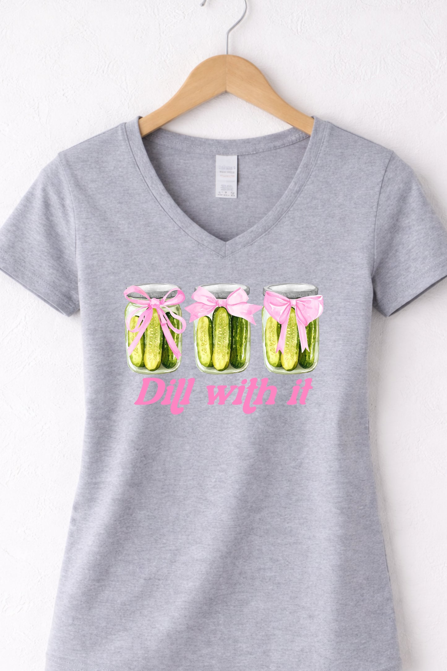 Grey women’s v neck pickle t shirt featuring trendy pickle lover “Dill With It” design