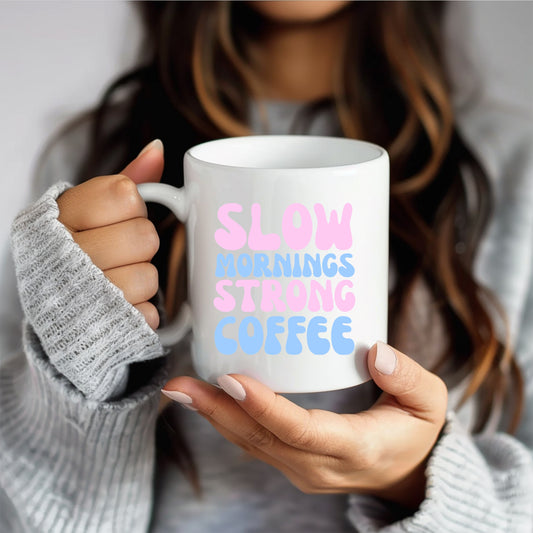 Morning coffee mug white porcelain with "Slow mornings strong coffee" text.