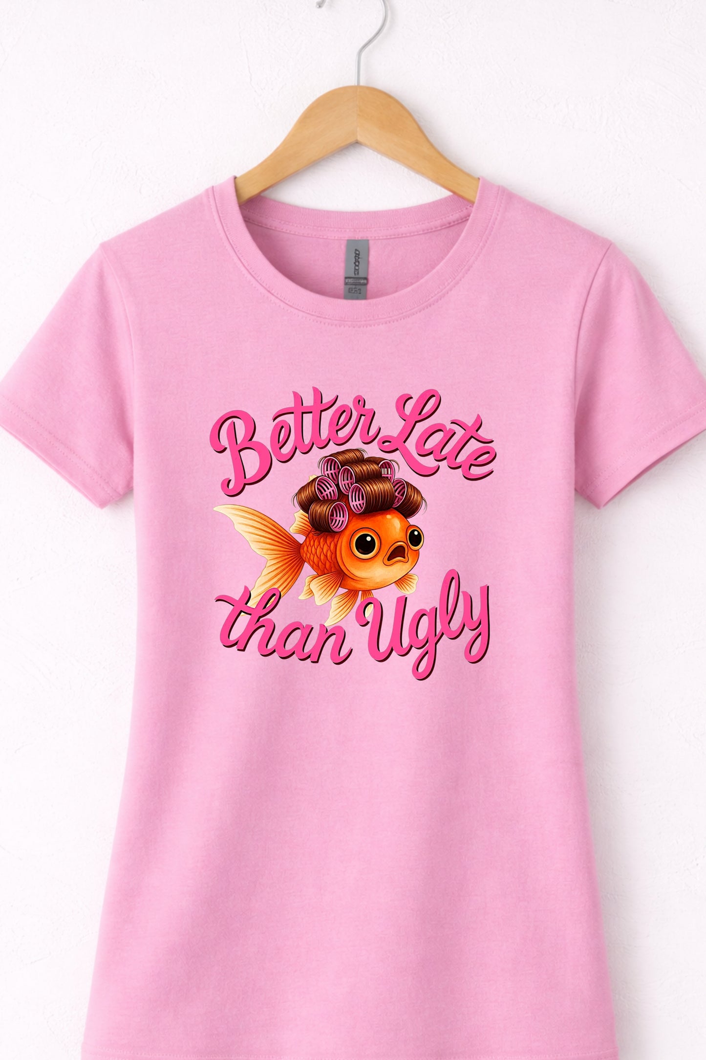 Pink women’s crewneck cute fish t shirt with glam goldfish and “Better Late Than Ugly” design
