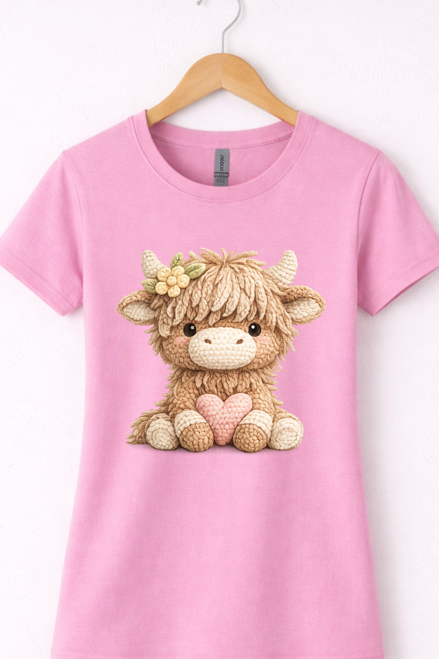 Women’s pink crewneck highland cow t shirt with cute animal cow holding a heart