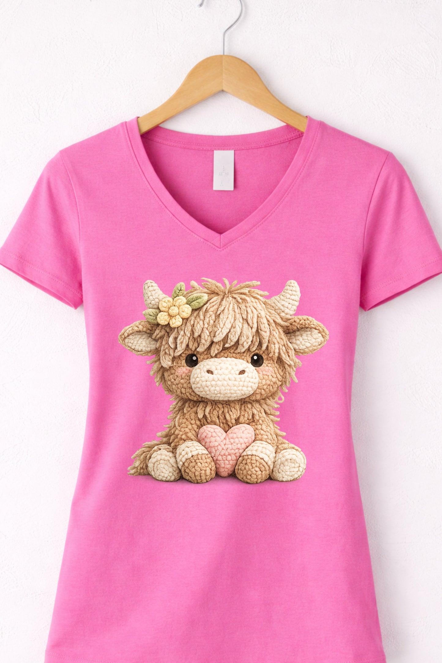 Women’s pink v neck highland cow t shirt with cute animal cow holding a heart