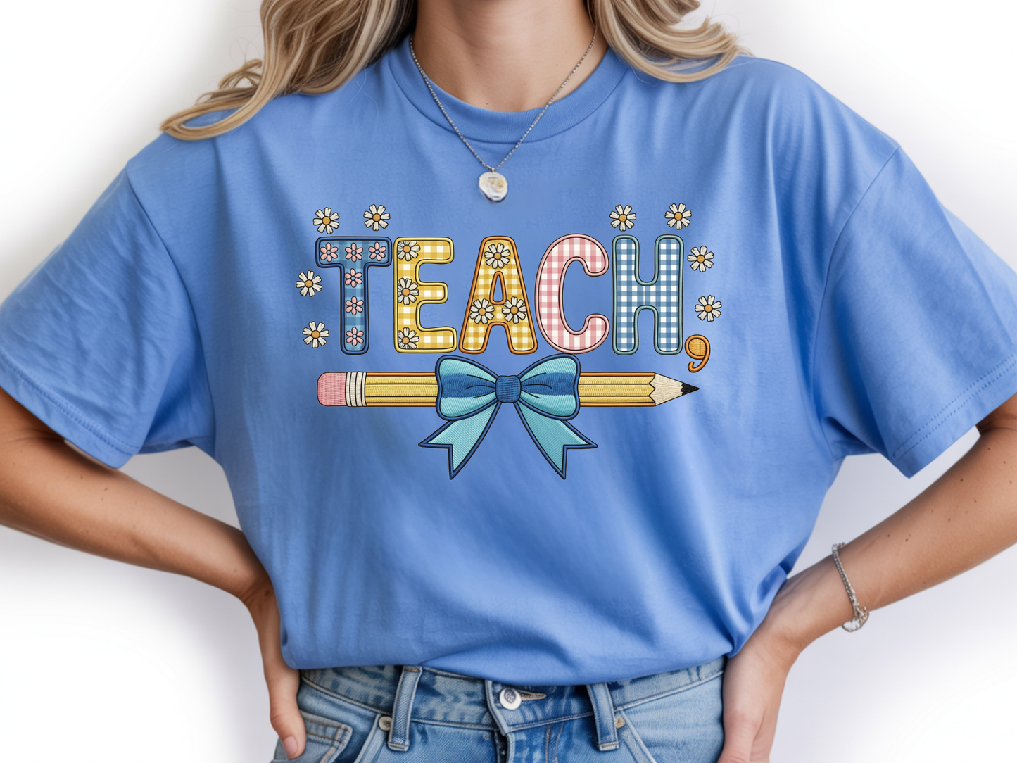 Teacher shirt for women with a cute pencil with blue bow graphic and "Teach" text on a blue unisex tee.