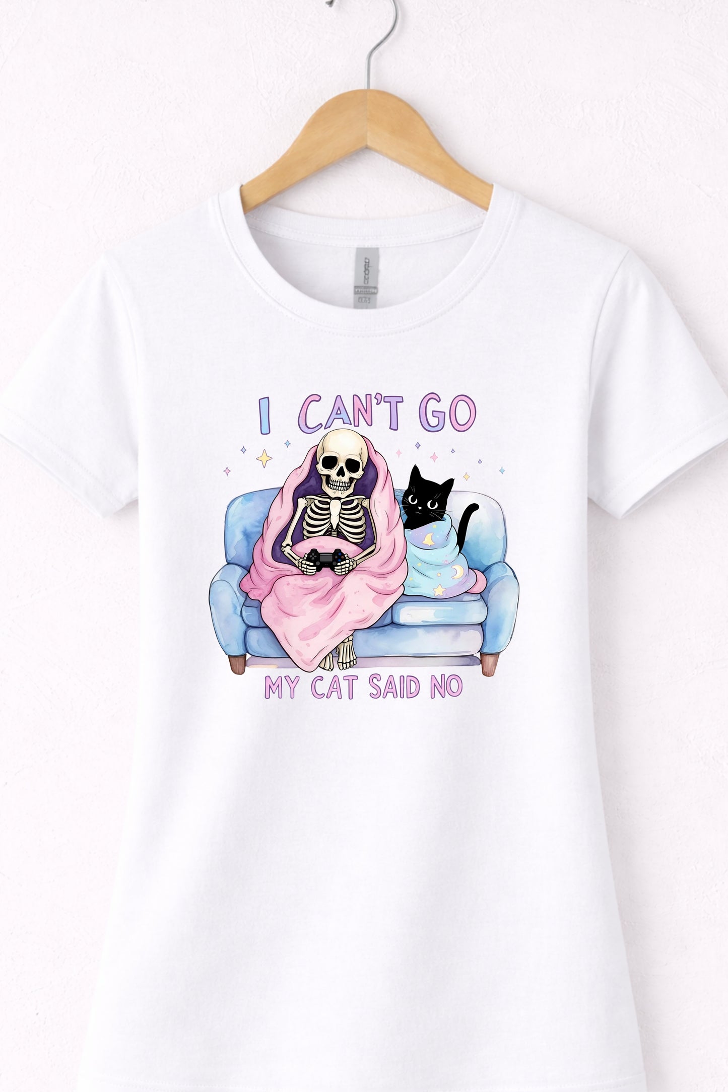 White women’s crewneck cat lover graphic tee with skeleton and “I Can’t Go My Cat Said No” design