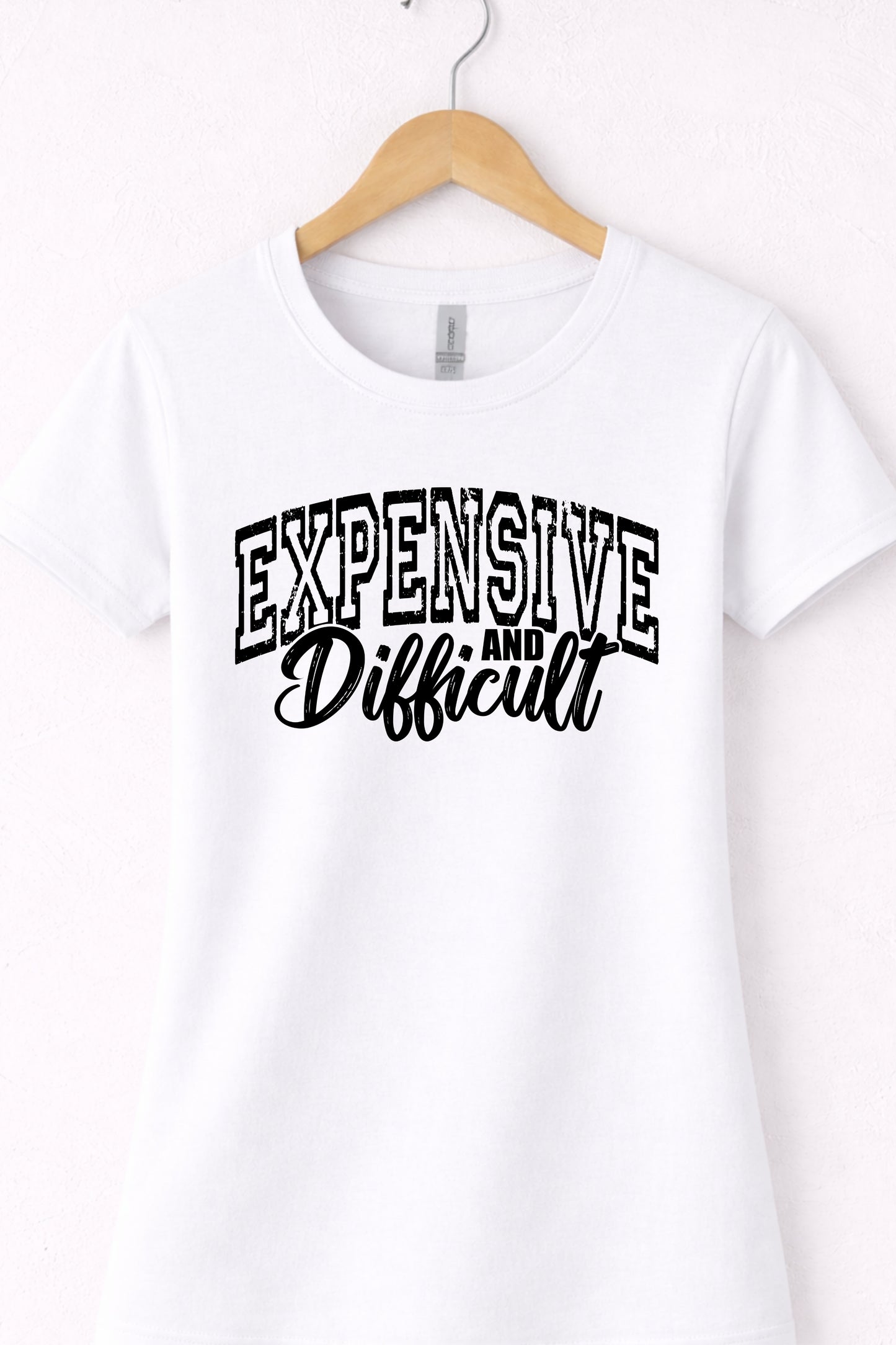 White women’s crewneck expensive and difficult shirt with bold confident statement typography