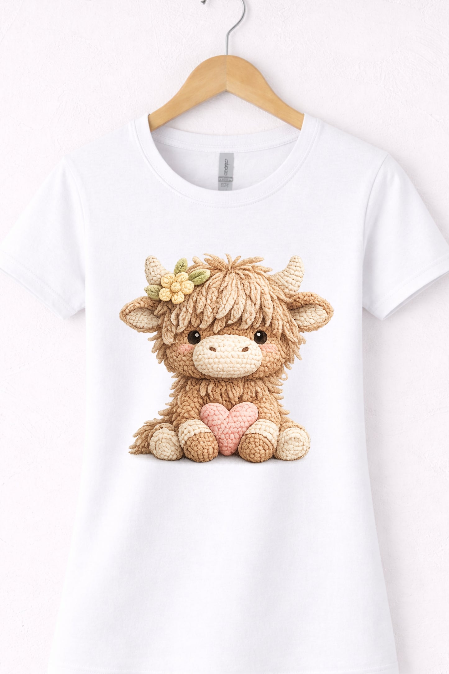 Women’s white crewneck highland cow t shirt with cute animal cow holding a heart